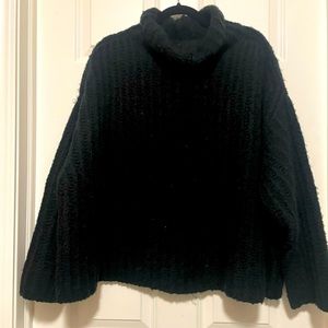 Black wool turtleneck sweater